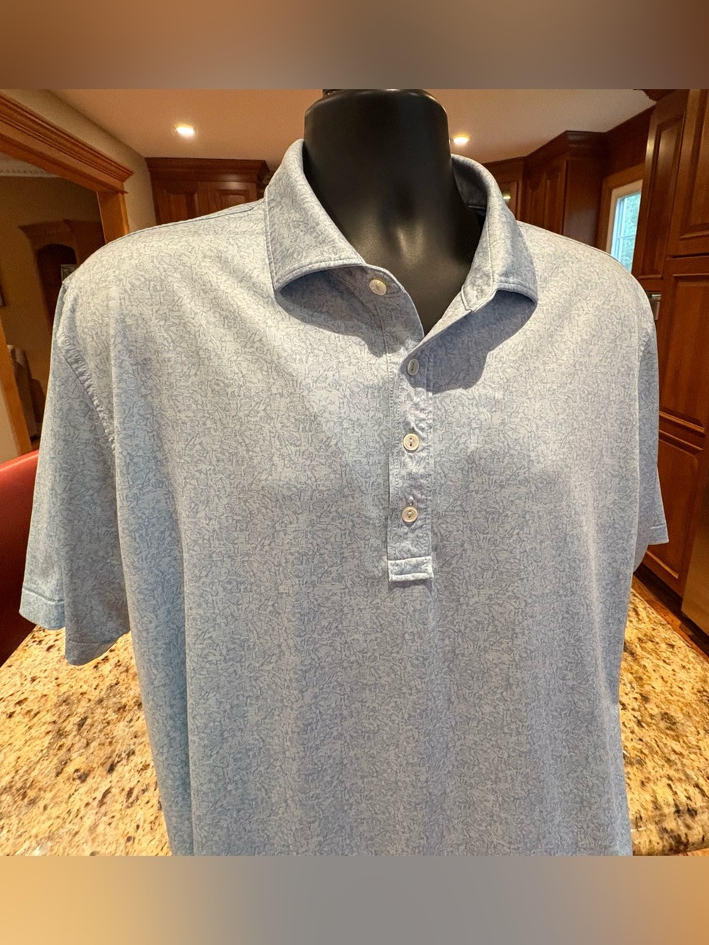 Peter Millar men’s crown crafted performance golf polo. blue print over white.